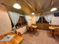 TV a/nebo společenská místnost v ubytování Penzión Šafran Stratená