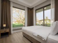 Postel nebo postele na pokoji v ubytování New Balturk Villas Sapanca