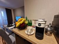 A kitchen or kitchenette at Апартамент RESORT SENSATION 3