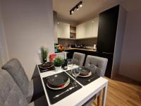 A kitchen or kitchenette at Апартамент RESORT SENSATION 3