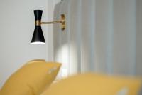 Posteľ alebo postele v izbe v ubytovaní Apartamentos Debambú