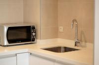 Kuchyňa alebo kuchynka v ubytovaní Apartamentos Debambú