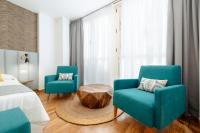 Posedenie v ubytovaní Apartamentos Debambú