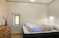 Postel nebo postele na pokoji v ubytování 2 Bedroom Pet Friendly Home In Nexø