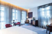 Ann Siang House, The Unlimited Collection managed by The Ascott Limitedにあるベッド