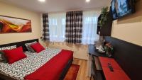 Posteľ alebo postele v izbe v ubytovaní Lucsony Apartman