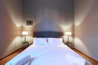 A bed or beds in a room at Elegant Sempione Apartment