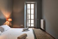 A bed or beds in a room at Elegant Sempione Apartment