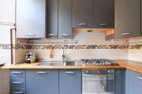 A kitchen or kitchenette at Elegant Sempione Apartment