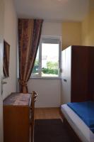 Posteľ alebo postele v izbe v ubytovaní Apartment in Banjol with balcony, air conditioning, WiFi, dishwasher 4888-1