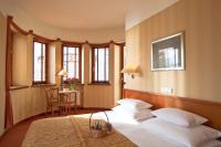 Łóżko lub łóżka w pokoju w obiekcie Hotel Willa Lubicz