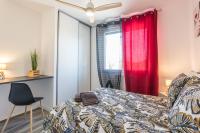 a bedroom with a bed and a red curtain at - LUXUEUX CASA SELVA - Parking Gratuit - Spacieux - balcon - Wifi in Viriat