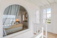 Posteľ alebo postele v izbe v ubytovaní Aquileria Seaview Pool Villa - Seven Bedrooms