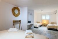 Posteľ alebo postele v izbe v ubytovaní Aquileria Seaview Pool Villa - Seven Bedrooms