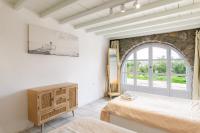 Posteľ alebo postele v izbe v ubytovaní Aquileria Seaview Pool Villa - Seven Bedrooms