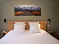 Posteľ alebo postele v izbe v ubytovaní Motel 991