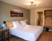 Posteľ alebo postele v izbe v ubytovaní Motel 991