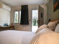 Posteľ alebo postele v izbe v ubytovaní Motel 991