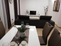 TV a/nebo společenská místnost v ubytování Apartment in Duce with sea view, terrace, air conditioning, WiFi 3423-6