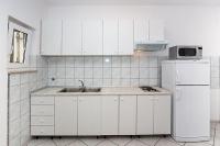 Kuchyňa alebo kuchynka v ubytovaní Apartment in Duce with sea view, terrace, air conditioning, WiFi 3423-3