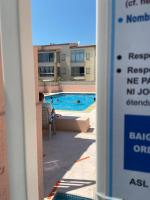 Bazén v ubytovaní Résidence ALOA - Cap d'Agde alebo v jeho blízkosti