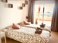 Posteľ alebo postele v izbe v ubytovaní Elviria Apartment