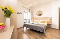 Postel nebo postele na pokoji v ubytování Suncanarias Hotel Adeje Plaza