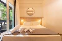 Postel nebo postele na pokoji v ubytování Suncanarias Hotel Adeje Plaza