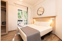 Postel nebo postele na pokoji v ubytování Suncanarias Hotel Adeje Plaza