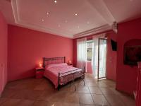 A bed or beds in a room at RaRoom Colors