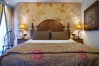 Posteľ alebo postele v izbe v ubytovaní Hotel Kassaros