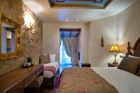 Posteľ alebo postele v izbe v ubytovaní Hotel Kassaros