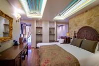 Posteľ alebo postele v izbe v ubytovaní Hotel Kassaros