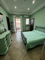 A bed or beds in a room at RaRoom Colors