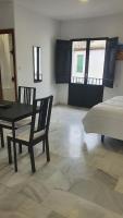 Posteľ alebo postele v izbe v ubytovaní CASA MORENA MiA APARTAMENTOS