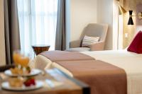 Posteľ alebo postele v izbe v ubytovaní Apartamentos Debambú