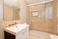 Kúpeľňa v ubytovaní Apartamentos Debambú
