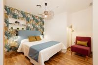 Posteľ alebo postele v izbe v ubytovaní Apartamentos Debambú