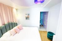 Posteľ alebo postele v izbe v ubytovaní Appartement Aquaroom RDC - Plage 50m - Rue gratuite