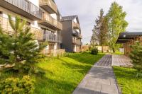 Vonkajšia záhrada v ubytovaní Apartament SEAGRASS SurfingBird Dźwirzyno