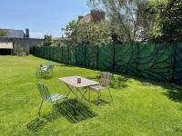 Ogród w obiekcie Appartement Bollyroom - Plage 50m - Rue gratuite