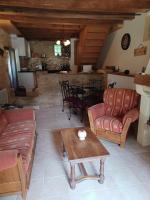 Część wypoczynkowa w obiekcie Gîtes Le clos de Veyrignac