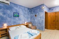 Posteľ alebo postele v izbe v ubytovaní Guest House Rajic