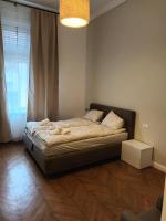 Posteľ alebo postele v izbe v ubytovaní Duna River Shining Apartments