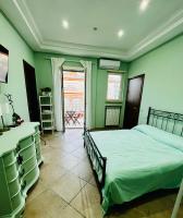 A bed or beds in a room at RaRoom Colors