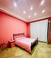 A bed or beds in a room at RaRoom Colors