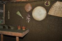 Una cocina con una encimera y algunos utensilios en una pared. en Coco Eco Lodge, en Melsiripura