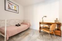 Postel nebo postele na pokoji v ubytování Apartamento Centro Sacio I