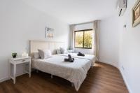Postel nebo postele na pokoji v ubytování Apartamento Centro Sacio I