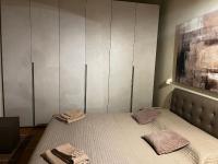 A bed or beds in a room at Maison del Ducato Cavour 37